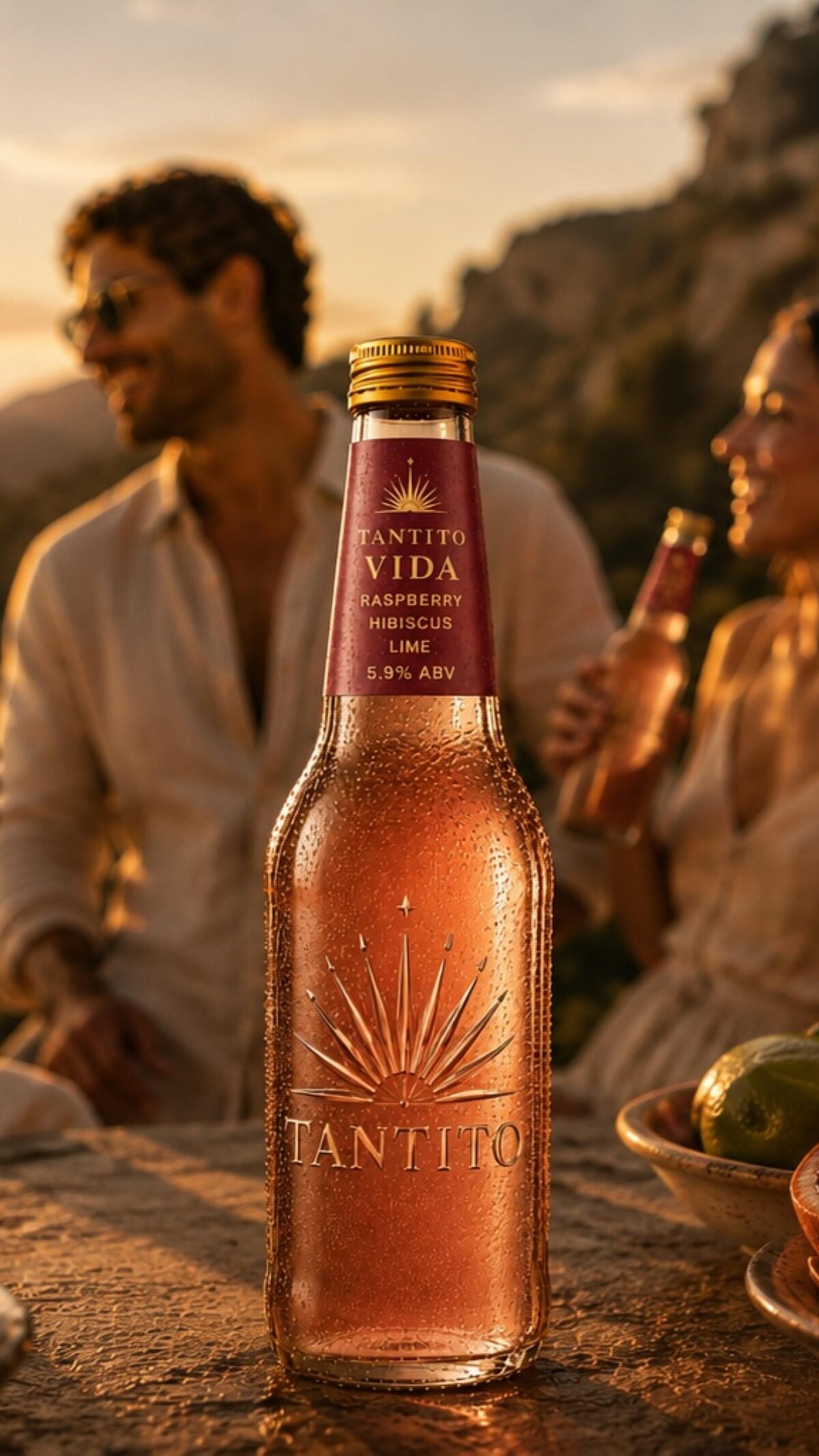 Tantito VIDA infused tequila kombucha bottle at a golden hour table